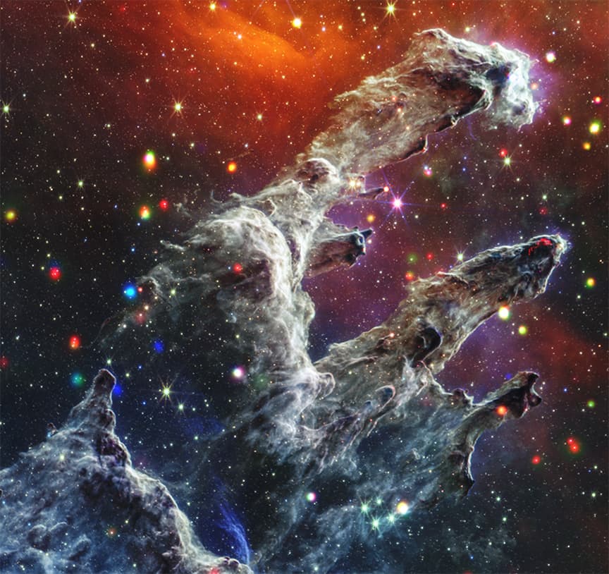 Chandra and Webb composite of the Pillars of Creation in the Eagle Nebula.